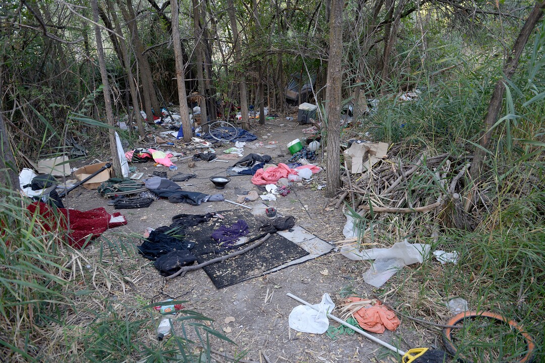 (Al Hartmann  |  The Salt Lake Tribune) 	After Operation Rio Grande, homeless camps have popped up everywhere.  Some of the homeless have set up camps in the thick vegetation near the Jordan River south of 3900 S. and 900 W. just 50 yards off the Jordan River Parkway Trail.  Camps are full of garbage, tarps, coolers and sleeping bags.  Disposal of human waste at the camps is a health problem. 
