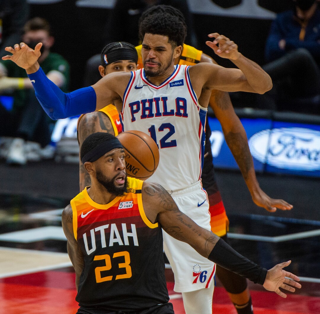 (Rick Egan | The Salt Lake Tribune)  Utah Jazz forward Royce O'Neale (23) and Philadelphia 76ers forward Tobias Harris (12) go after a loose ball, in NBA action between the Utah Jazz and the Philadelphia 76ers at Vivint Arena, on Monday, Feb. 15, 2021.