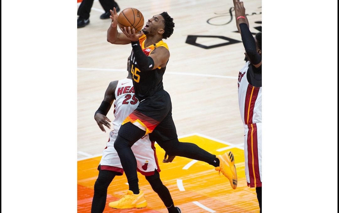 (Francisco Kjolseth  | The Salt Lake Tribune) Utah Jazz guard Donovan Mitchell (45) pushes past the defense as the Utah Jazz take on the Miami Heat at Vivint Smart Home Arena in Salt Lake City, on Saturday, Feb. 13, 2021.