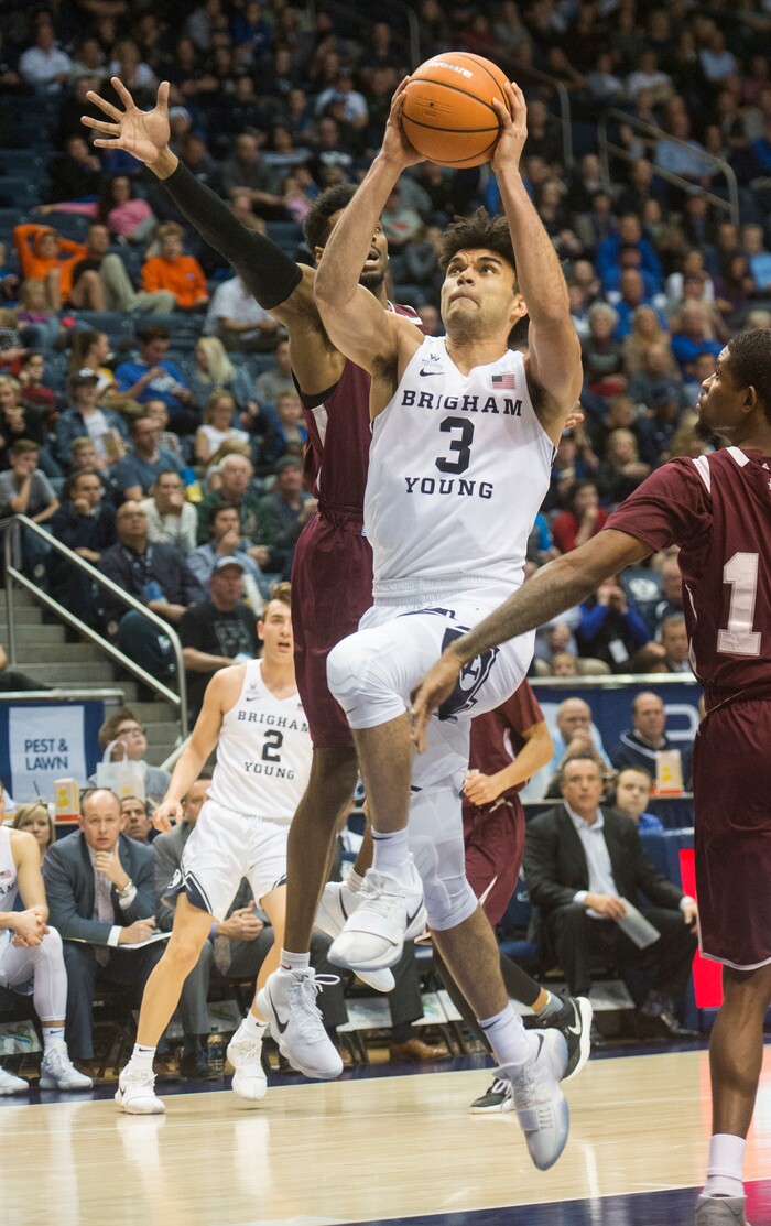(Rick Egan  |  The Salt Lake Tribune)   Brigham Young Cougars guard Elijah Bryant (3) takes the ball to the hoop, in basketball action, Brigham Young Cougars vs Texas Southern Tigers, at the Marriott Center in Provo, Saturday, December 23, 2017.