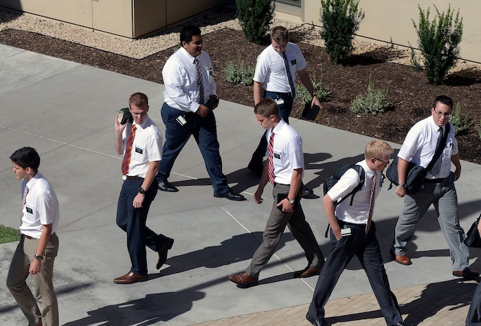 Al Hartmann  |  The Salt Lake TribuneMissionaries come and go on the plaza of the new building at the Missionary Training Center in Provo Wednesday July 26.  
