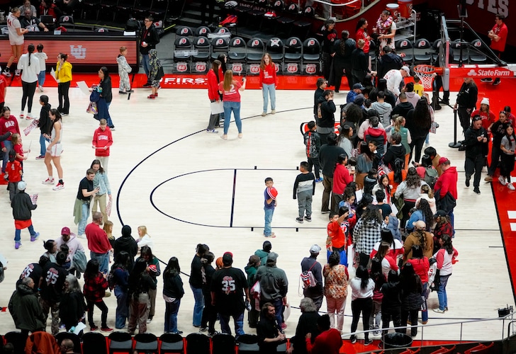 (Bethany Baker | The Salt Lake Tribune) Fans line up to meet Utah Utes forward Alissa Pili following a game at Jon M. Huntsman Center in Salt Lake City on Saturday, March 2, 2024.