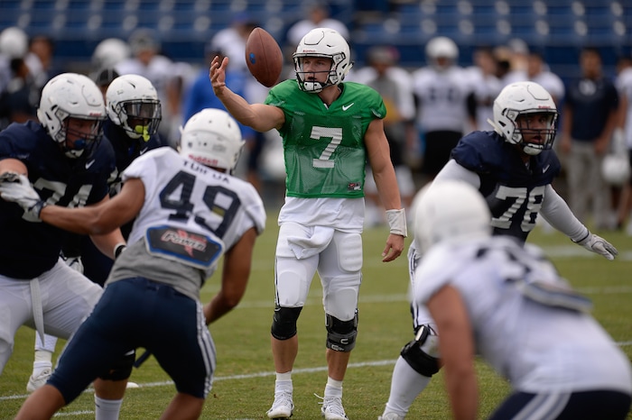 (Francisco Kjolseth  |  The Salt Lake Tribune)  Quarterback Beau Hoge lets a ball go after hearing the whistle as BYU holds a scrimmage at LaVell Edwards Stadium in Provo on Thursday, Aug. 10, 2017.
