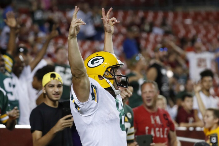 Green Bay Packers quarterback Taysom Hill (8) celebrates his touchdown during the second half of an NFL preseason football game against Washington in Landover, Md., Saturday, Aug. 19, 2017. (AP Photo/Alex Brandon)