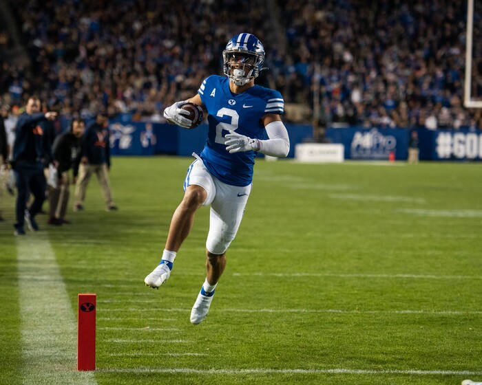 (Trevor Christensen | Special to The Tribune) Brigham Young University's Neil Pau'u hop-skips into the end zone against Virginia during the second half at LaVell Edwards Stadium on Saturday, Oct. 30, 2021, in Provo.