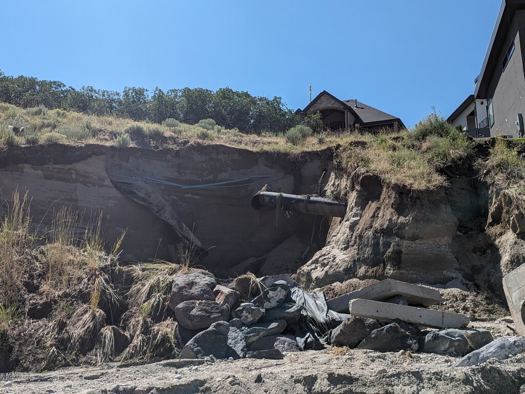 (Siena Duncan | Salt Lake Tribune) An area of Draper just north of the Draper LDS Temple was damaged by flooding on Thursday, August 3, 2023, breaking a large pipe at the end of Rambling Road — seen here on Monday, Aug. 7, 2023. Heavy rains caused road closures at several spots in the city.