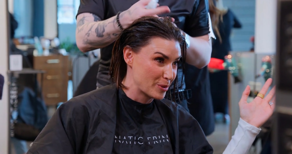 (Bravo) Bronwyn Newport talks with Angie Katsanevas while getting her hair done at Angie's Lunatic Fringe salon in Salt Lake City, in a moment from "The Real Housewives of Salt Lake City."