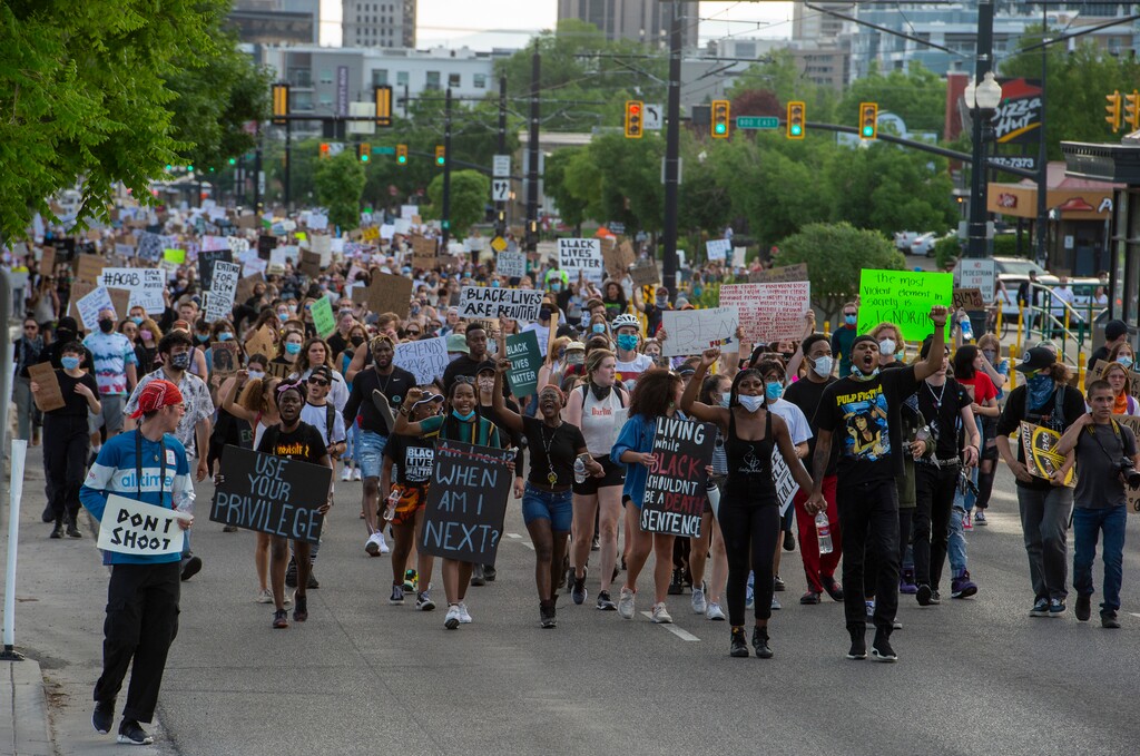 (Rick Egan  |  The Salt Lake Tribune)    Protesters chant as they march up 300 South, Wednesday, June 3, 2020.