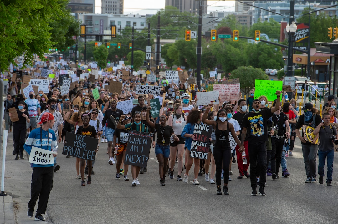 (Rick Egan  |  The Salt Lake Tribune)    Protesters chant as they march up 300 South, Wednesday, June 3, 2020.