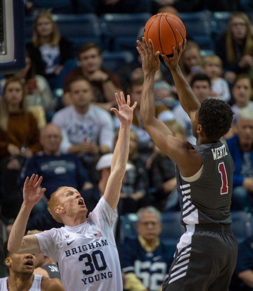 (Rick Egan  |  The Salt Lake Tribune)      Santa Clara Broncos guard Trey Wertz (1) shoots as Brigham Young Cougars guard TJ Haws (30) defends, in basketball action between Brigham Young Cougars and Santa Clara Broncos at the Marriott Center in Provo, Saturday, Jan. 12, 2019.