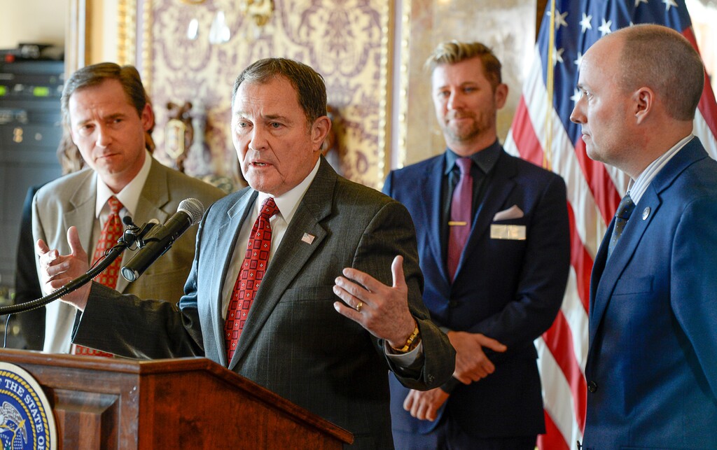 (Francisco Kjolseth | The Salt Lake Tribune) Gov. Gary Herbert and others announce the creation of a community teen suicide prevention task force to combat the state's rising youth suicide problems during a press event at the Utah Capitol on Wed. Jan. 17, 2018. Also pictured are Rep. Steve Eliason, left, and Lt. Gov. Spencer Cox, at right, who will co-chair the task force and Troy Williams, executive director for Equality Utah, in background.