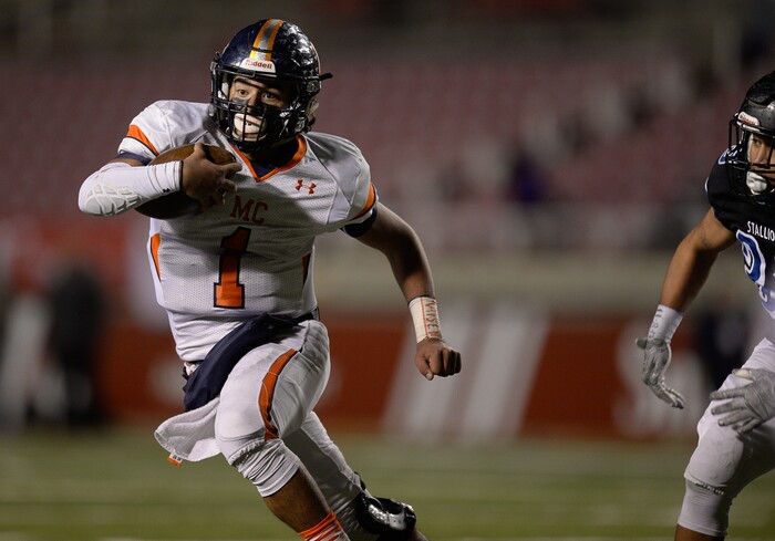 (Francisco Kjolseth  |  The Salt Lake Tribune)  Quarterback Brady Hall of Mountain Crest eludes the Stansbury defense in their class 4A semifinal game at Rice-Eccles Stadium, Thursday, Nov. 9, 2017.
