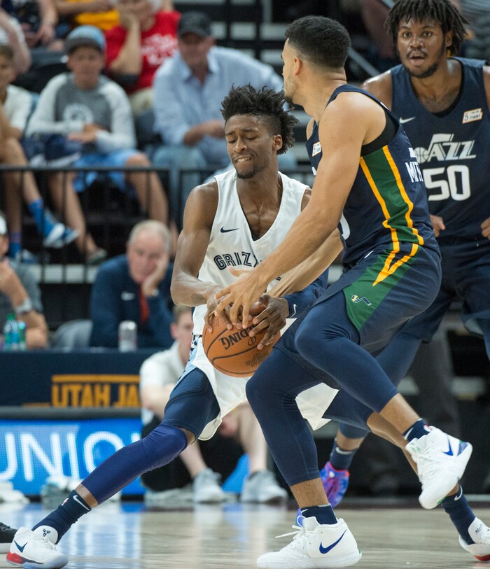 (Rick Egan  |  The Salt Lake Tribune)      Memphis Grizzlies guard Kobi Simmons (2) strips the ball from Utah Jazz guard Naz Mitrou-Long (30), in Utah Jazz summer league action between Utah Jazz and Memphis Grizzlies in Salt Lake City, Tuesday, July 3, 2018.