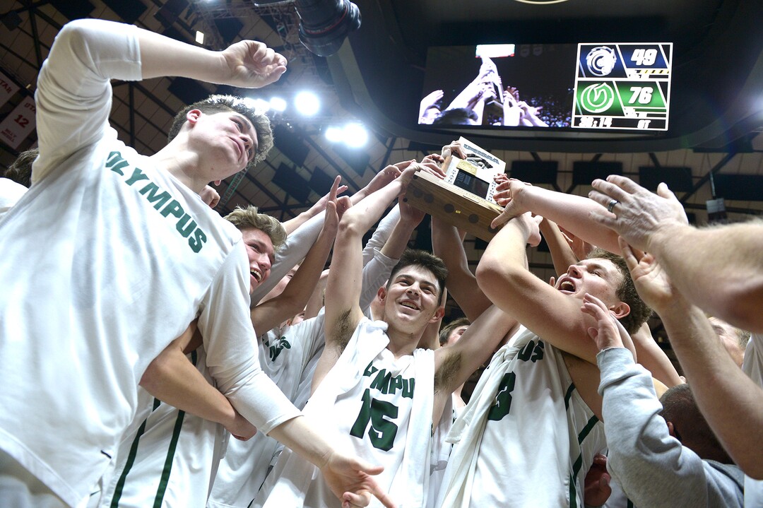 (Leah Hogsten  |  The Salt Lake Tribune) Olympus celebrates the win. Olympus defeated Corner Canyon 76-49 to win the 5A High School Boys’ Basketball Tournament Championship at the Jon M. Huntsman Center in Salt Lake City,  Saturday, March 3, 2018. 