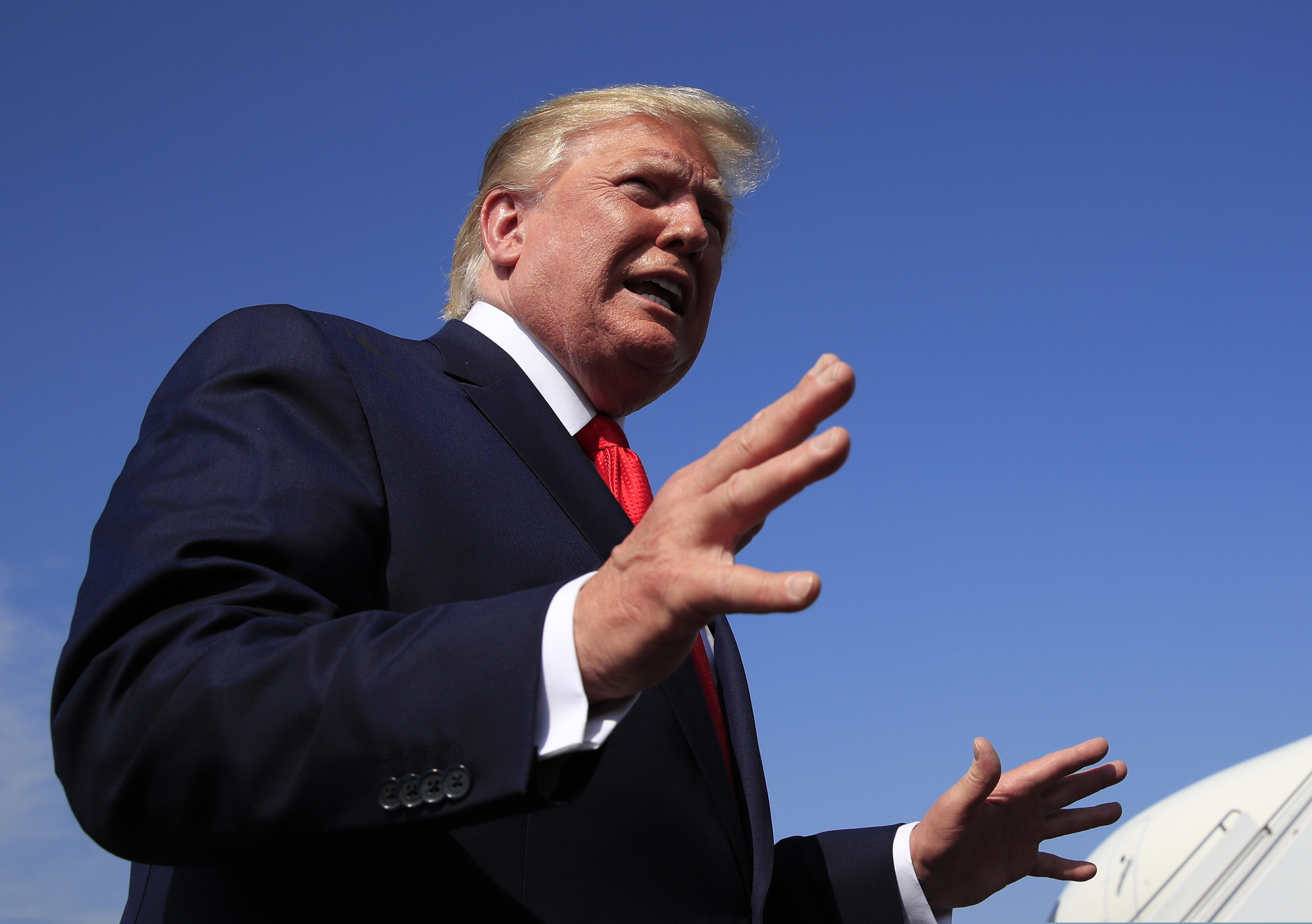 (Manuel Balce Ceneta | AP) President Donald Trump speaks at Morristown Municipal Airport in Morristown, N.J., on his way returning back to the White House, Sunday, July 7, 2019.
