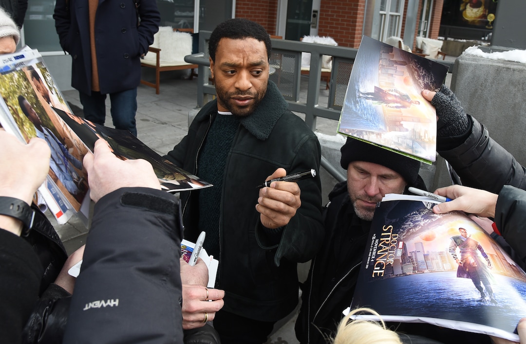 (Francisco Kjolseth  |  The Salt Lake Tribune)  Actor Chiwetel Ejiofor signs autographs as the Sundance Film Festival kicks into high gear along Main street in Park City on Friday, Jan. 25, 2019.