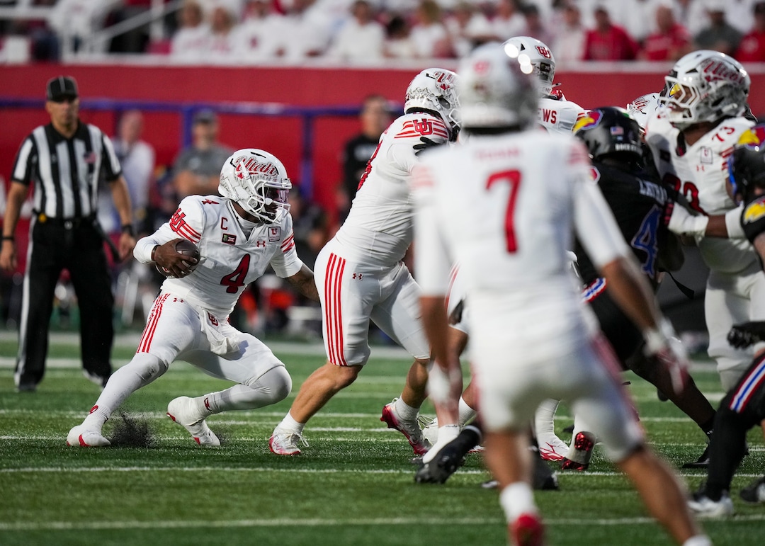 (Bethany Baker  |  The Salt Lake Tribune) Utah Utes quarterback Devon Dampier (4) looks to run the ball during the game between the Utah Utes and the Kansas Jayhawks at Rice-Eccles Stadium in Salt Lake City on Saturday, Oct. 10, 2026.