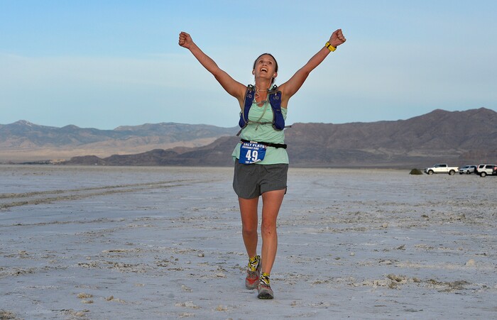(Scott Sommerdorf | The Salt Lake Tribune)
Melissa Soper celebrates as she crosses the finish line at the Salt Flats 100 Endurance Run, Saturday, May 5, 2018. Soper was the first woman to finish the race. She finished 9th overall.
