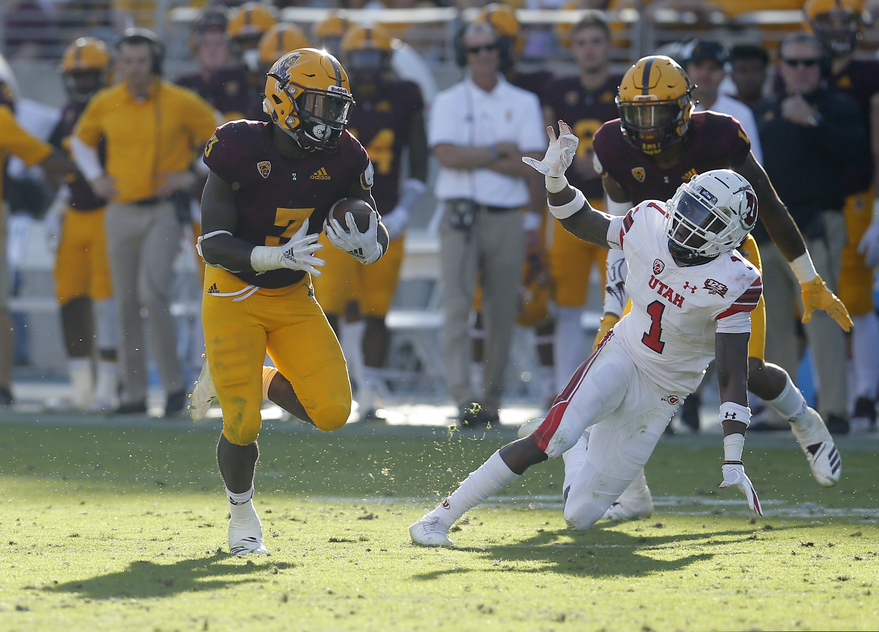 Arizona State running back Eno Benjamin (3) runs by Utah defensive back Jaylon Johnson (1) for a touchdown in the second half during an NCAA college football game, Saturday, Nov. 3, 2018, in Tempe, Ariz. (AP Photo/Rick Scuteri)