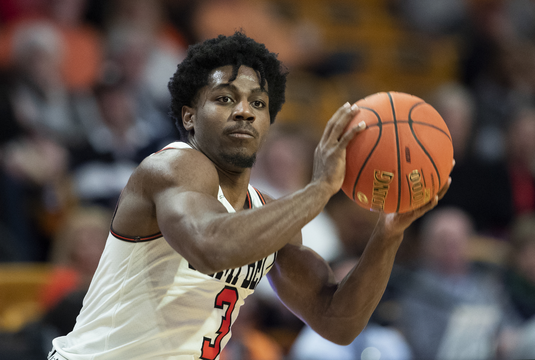 Campbell University guard Chris Clemons readies to pass the basketball against Presbyterian College in the second half of an NCAA basketball game Thursday, Jan. 24, 2019 in Buies Creek, N.C. Clemons keeps hitting shots near mid court logos, dunking in traffic and passing big names on the list of college basketball’s best all-time scorers. The national scoring leader at 29.1 points, has a fearless game packed into a 5-foot-9 frame, making the senior the headliner of college basketball’s crop of big-time undersized scorers _ including No. 10 Marquette’s Markus Howard and No. 12 Purdue’s Carsen Edwards. (AP Photo/Jason E. Miczek)