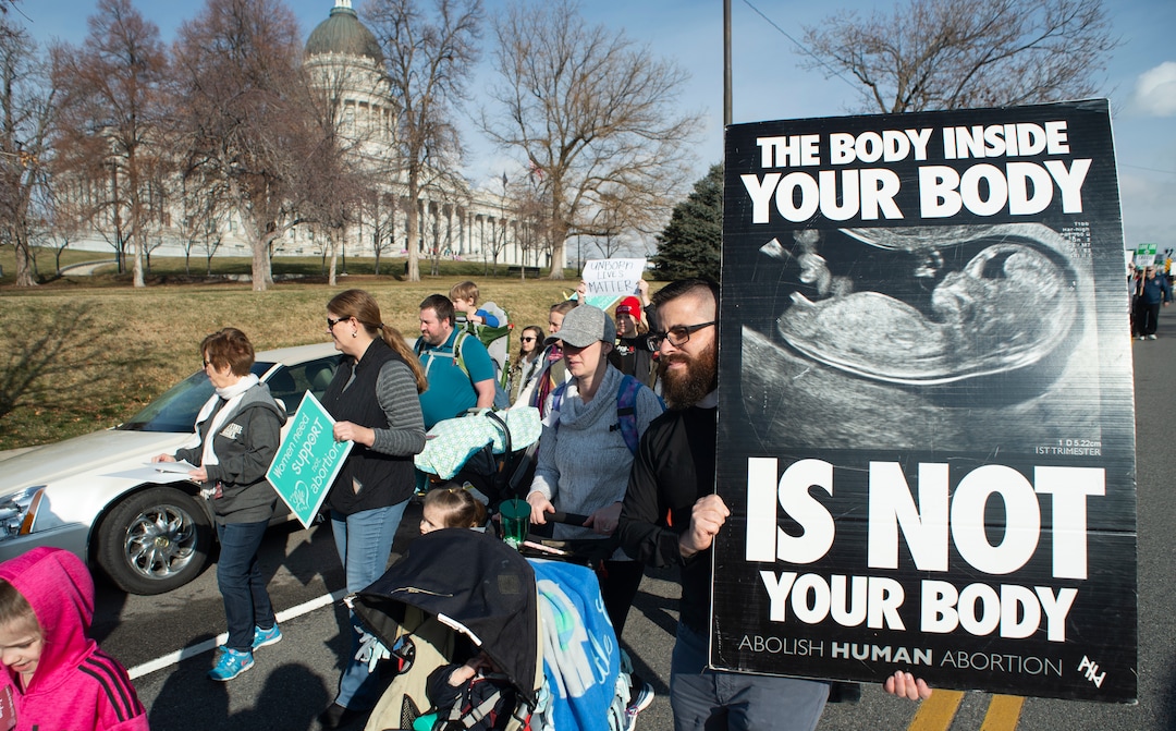 (Rick Egan  |  The Salt Lake Tribune)     Hundreds of marchers walk around the  Utah State Capitol, in the March for Life Utah 2020, Saturday, Jan. 25, 2020.