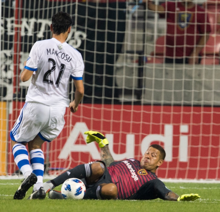 (Rick Egan  |  The Salt Lake Tribune)     Real Salt Lake goalkeeper Nick Rimando (18) sides in and blocks a kick by Montreal Impact forward Matteo Mancosu (21), in MLS action between Real Salt Lake and Montreal Impact, at Rio Tinto Stadium in Sandy, Saturday, Aug. 11, 2018.