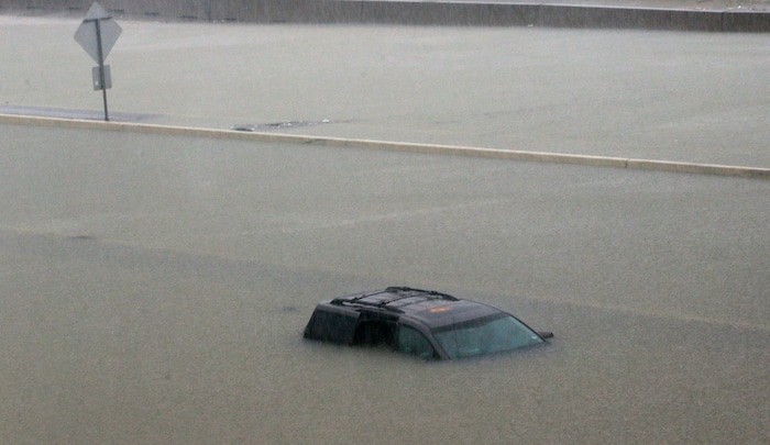(LM Otero | The Associated Press)  An abandoned vehicle sits in flood waters on the I-10 highway in Houston, Texas, Sunday, Aug. 27, 2017.