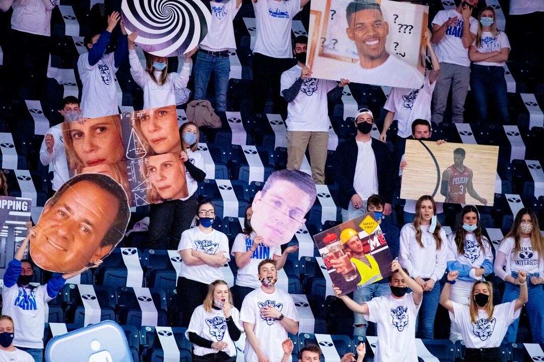 (Isaac Hale | Special to The Tribune) Brigham Young University students try and distract a St. Mary's College foul shooter during a game between the BYU Cougars and the Saint Mary’s College of California Gaels held at the Marriott Center in Provo on Saturday, Feb. 27, 2021.
