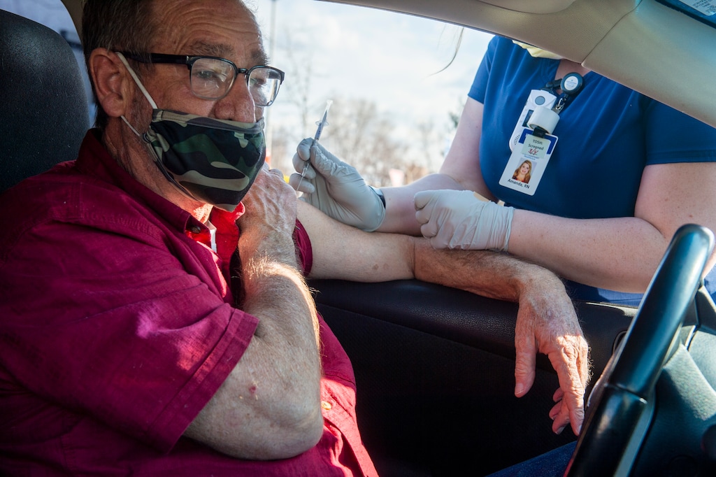 (Rick Egan | The Salt Lake Tribune) Amanda Bayly administers a Johnson & Johnson Covid-19 vaccination to Jay Gaisford, at TOSH - The Orthopedic Specialty Hospital in Murray on Tuesday, March 2, 2021. Gov. Spencer Cox announced Thursday that Utahns age 50 and older can start making appointments to get their COVID-19 vaccinations this coming Monday, Cox said younger adult Utahns with certain health conditions such as diabetes, Type 1 or Type 2, obesity with a BMI index of 30 or higher, and anyone with chronic kidney disease will also be eligible.