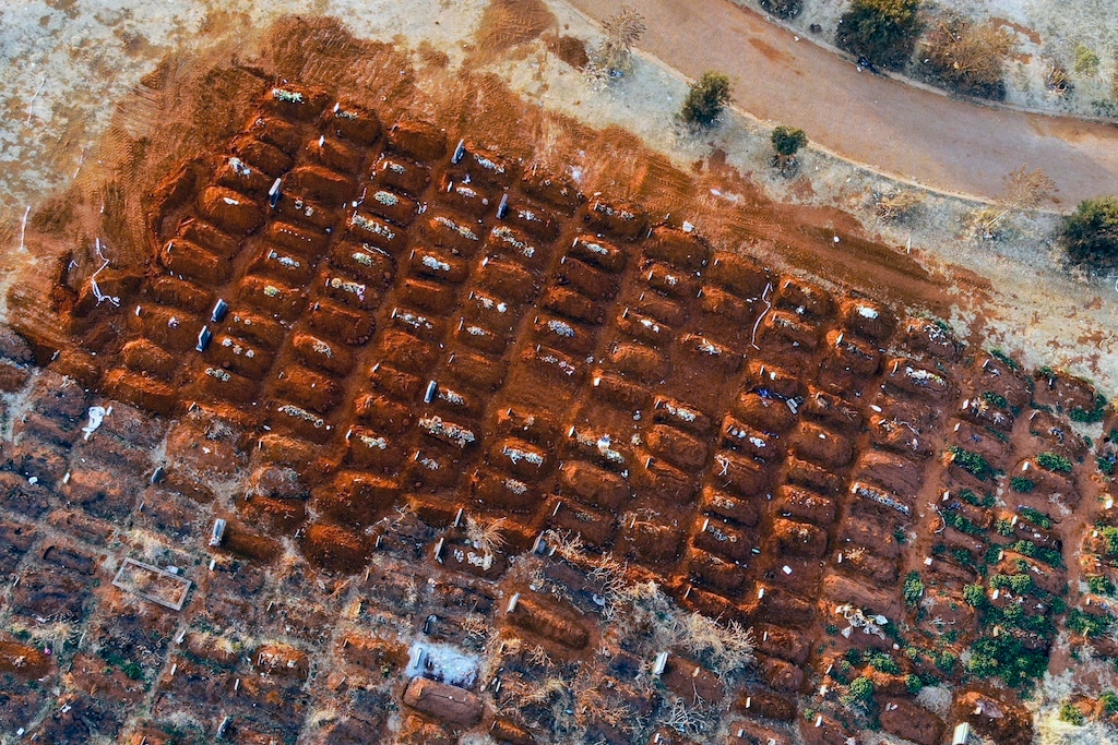 (Jerome Delay | AP file photo) In this Aug. 5, 2020, photo, recently filled graves are seen in the Olifantsveil Cemetery outside Johannesburg, South Africa. The worldwide death toll from the coronavirus eclipsed 1 million, nine months into a crisis that has devastated the global economy, tested world leaders' resolve, pitted science against politics and forced multitudes to change the way they live, learn and work.