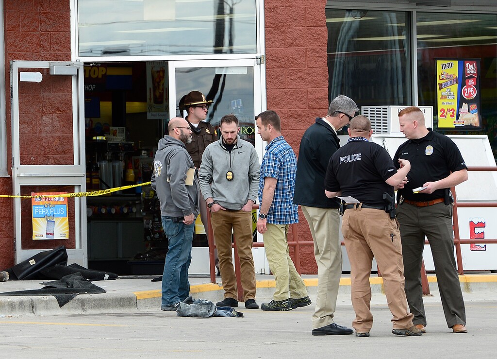 Scott Sommerdorf | The Salt Lake Tribune
Four police officers were taken to the hospital after trying to save the life of a man who poured gasoline over himself in the bathroom of the Chevron Top Stop at 300 West and 200 South in Kaysville, Thursday, April 5, 2018.