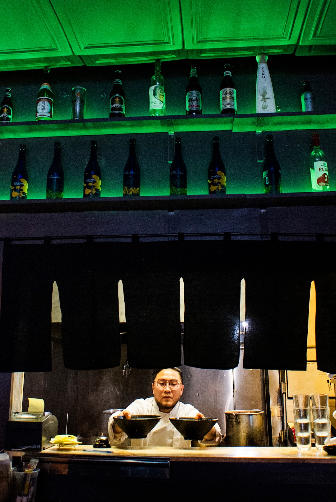 (Rick Egan  |  The Salt Lake Tribune)   Sergei Oveson serves up bowls on Ramen at the Ramen Bar in Salt Lake City, Wednesday, Jan. 16, 2019.
