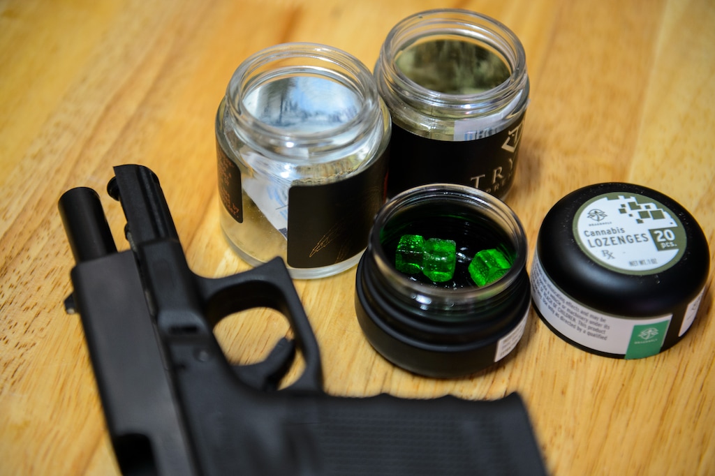 (Trent Nelson  |  The Salt Lake Tribune) Cannabis and a Glock 19 handgun, in Cottonwood Heights on Wednesday, April 21, 2021.