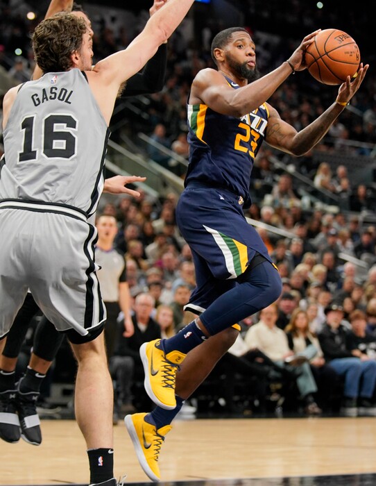 (Darren Abate | The Associated Press) Utah Jazz's Royce O'Neale (23) looks to pass as he is guarded by San Antonio Spurs' Pau Gasol during the second half of an NBA basketball game Saturday, Feb. 3, 2018, in San Antonio. Utah won 120-111.