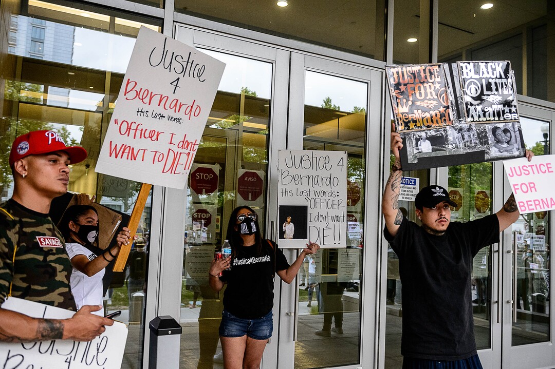 (Trent Nelson  |  The Salt Lake Tribune) People gather at the Salt Lake County District Attorney's office to protest against police brutality in Salt Lake City on Saturday, June 13, 2020.