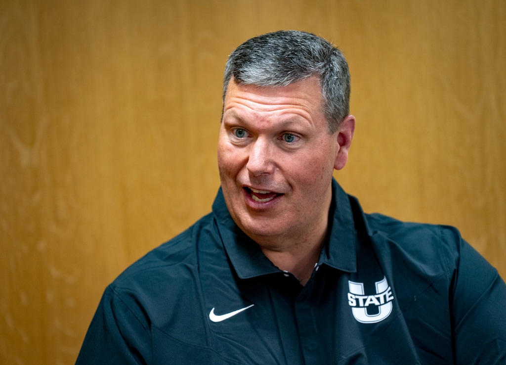(Rick Egan | The Salt Lake Tribune)  Associate head coach,Troy Morrell, is interviewed on media day at the Jim and Carol Laub Athletics-Academics Complex, at Utah State University, on Thursday, Aug. 1, 2024.