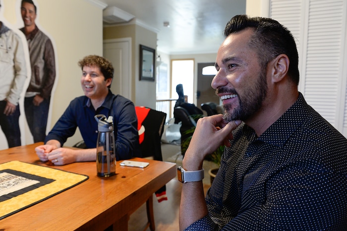 (Francisco Kjolseth | The Salt Lake Tribune) The Piano Guys videographer Paul Anderson, left, and music producer Al van der Beek joke around the dining room table of Al's former home in Sandy turned studio for the American musical group.