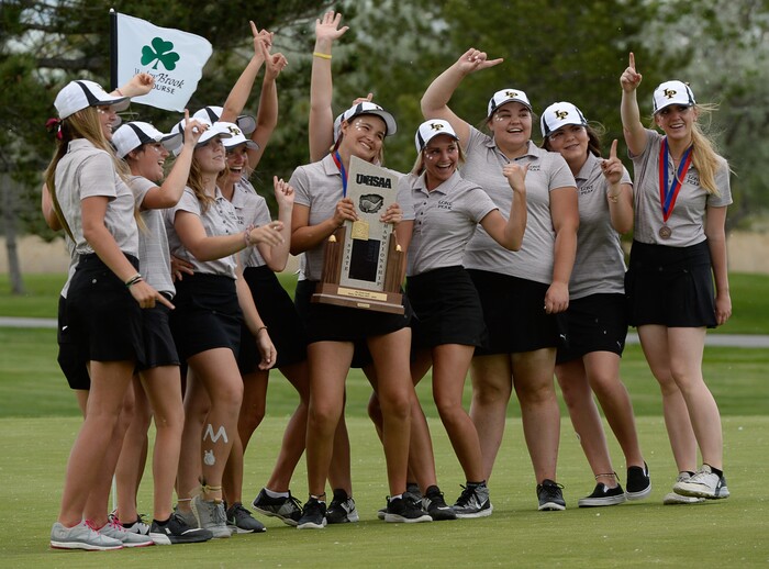 (Francisco Kjolseth  |  The Salt Lake Tribune)  Lone Peak celebrates their team title as Lauren Taylor holds the trophy on day two of the Class 6A girls' golf state tournament at Meadow Brook Golf Course in Taylorsville on Tuesday, May 15, 2018.