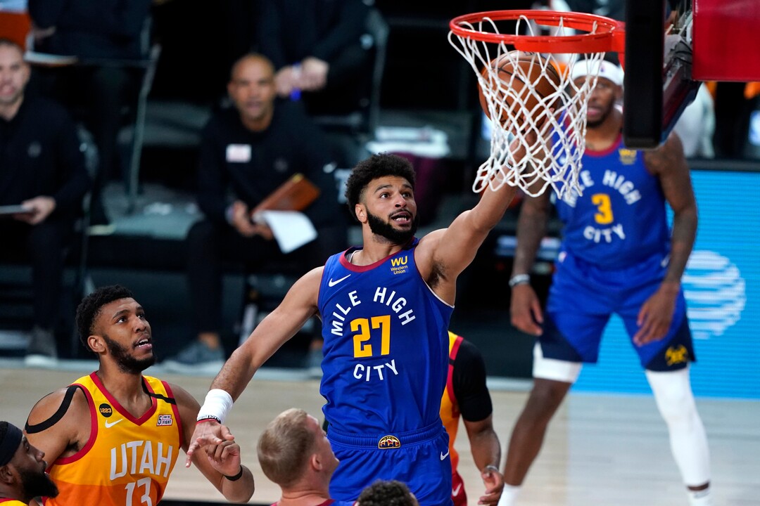 Denver Nuggets' Jamal Murray (27) goes up for a shot against the Utah Jazz during the first half of an NBA basketball first round playoff game Sunday, Aug. 30, 2020, in Lake Buena Vista, Fla. (AP Photo/Ashley Landis)