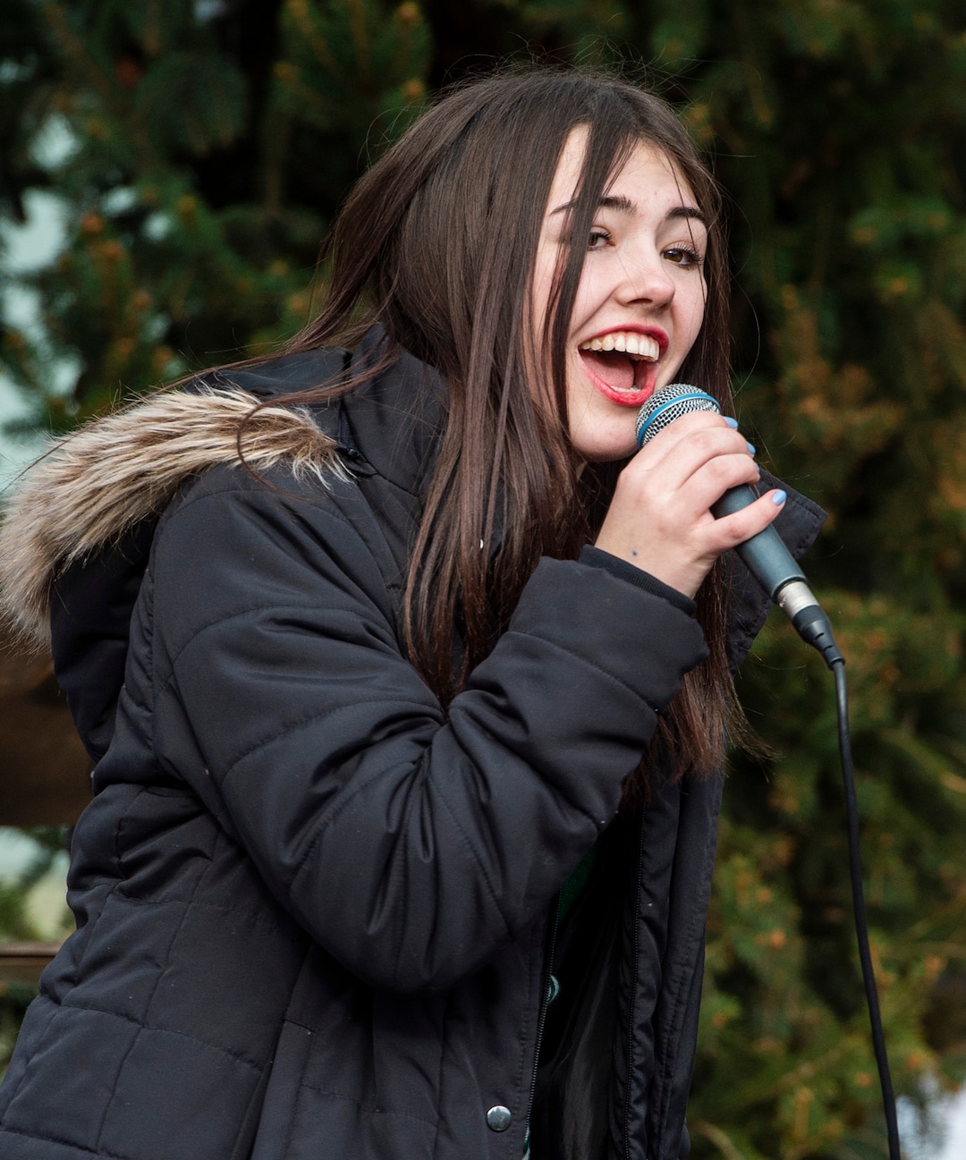 (Rick Egan  |  The Salt Lake Tribune)       Grace Lynterzo sings for The School of Rock at the second annual Made in Utah Winter Fest at The Gateway.  The free festival includes local artists, musicians, artisans, breweries, distilleries, food trucks, and other local businesses, to help promote shopping locally for holidays. The Utah Winter Fest continues December 21 & 22. Sunday, Dec. 15, 2019.