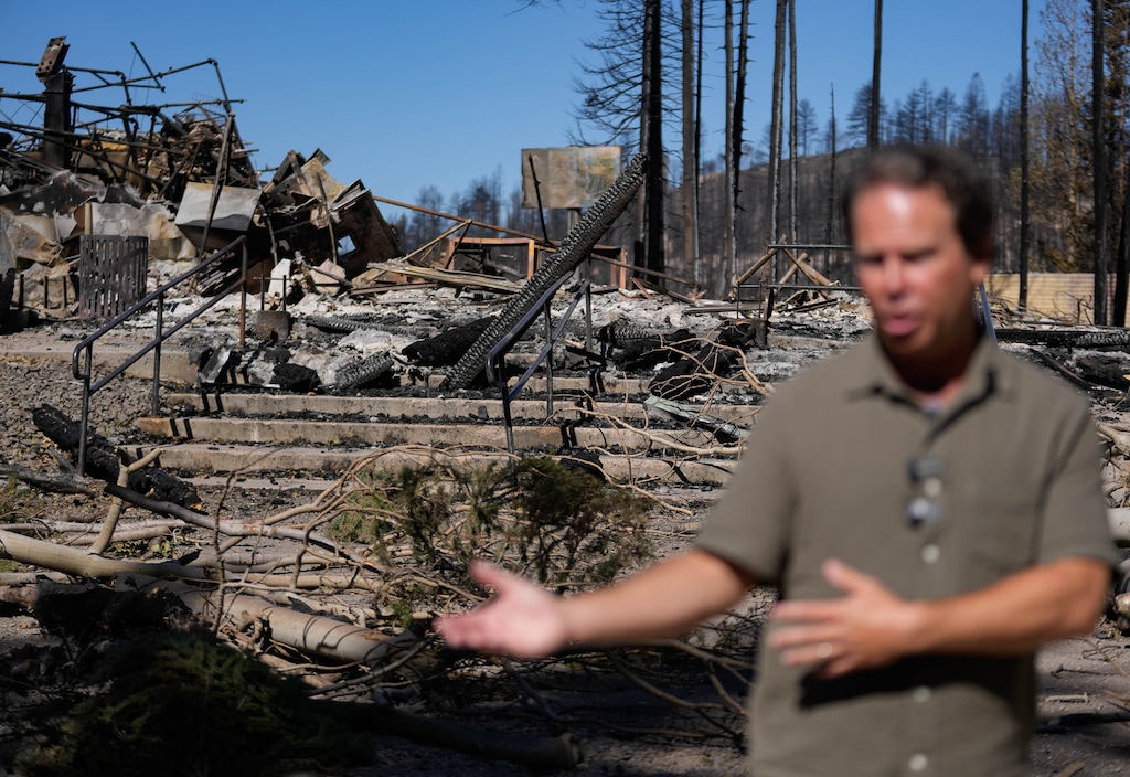 (Francisco Kjolseth | The Salt Lake Tribune) Shane Gadbaw, owner of Eagle Point Resort, stands next to the remains of the Canyonside Lodge that was destroyed by the Cottonwood Fire that started in late June.