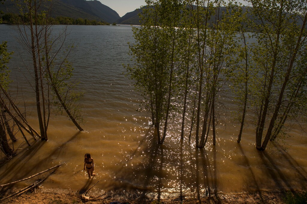 (Leah Hogsten  |  Tribune file photo)  Alyssa Klein of Ogden spent her Tuesday wading and relaxing in the water of Pineview Reservoir, May 30, 2017.