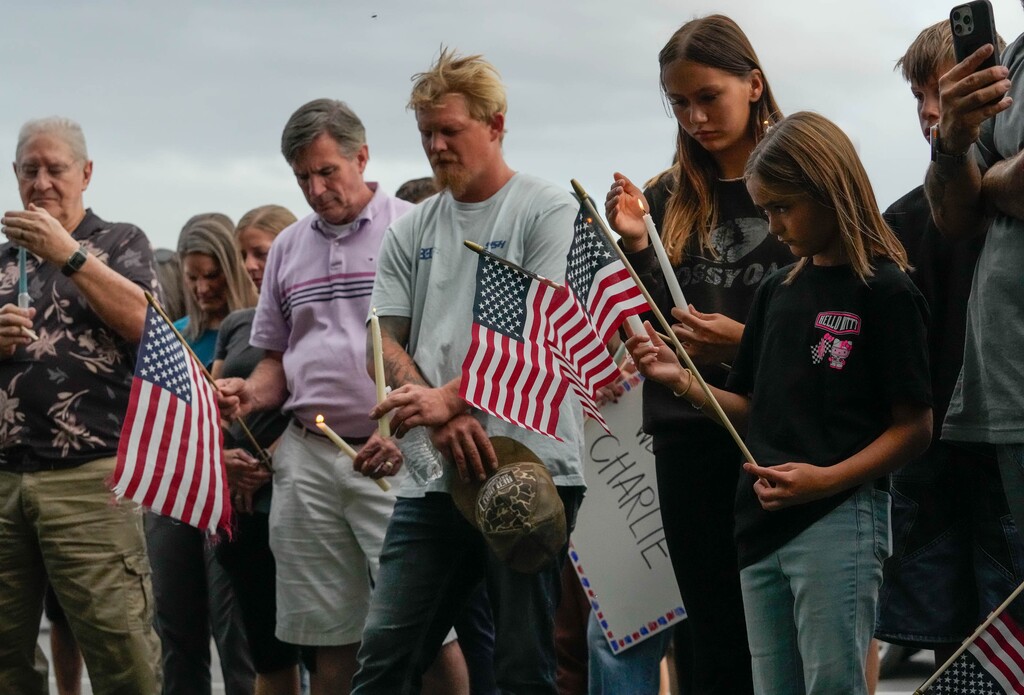 (Francisco Kjolseth | The Salt Lake Tribune) People gather for a candlelight vigil outside Timpanogos Regional Hospital in Orem in support of Charlie Kirk after he was shot and killed at Utah Valley University, Wednesday, Sept. 10, 2025.