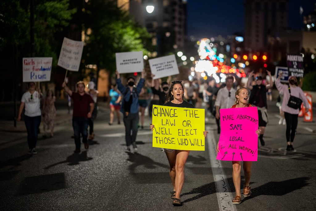(Trent Nelson  |  The Salt Lake Tribune) People march in Salt Lake City to protest after the U.S. Supreme Court overruled Roe v. Wade, on Friday, June 24, 2022.