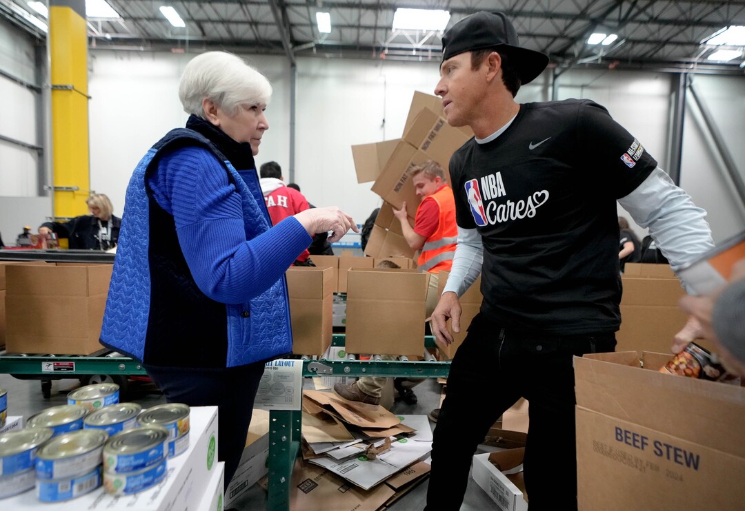 (Francisco Kjolseth | The Salt Lake Tribune) Former Utah Jazz owner Gail Miller packs food boxes alongside current Jazz owner Ryan Smith during the NBA Cares Day of Service in Salt Lake City on Feb. 17, 2023.