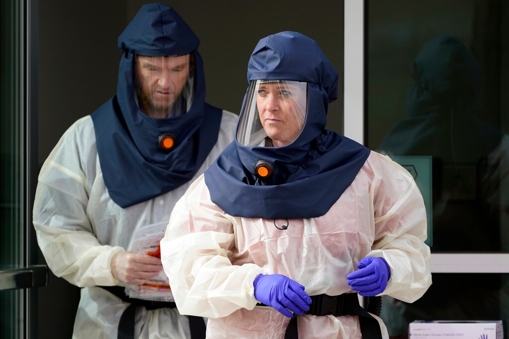 (Rick Bowmer | AP photo)

Salt Lake County Health Department public health nurses look on during coronavirus testing outside the Salt Lake County Health Department, Oct. 23,, in Salt Lake City.