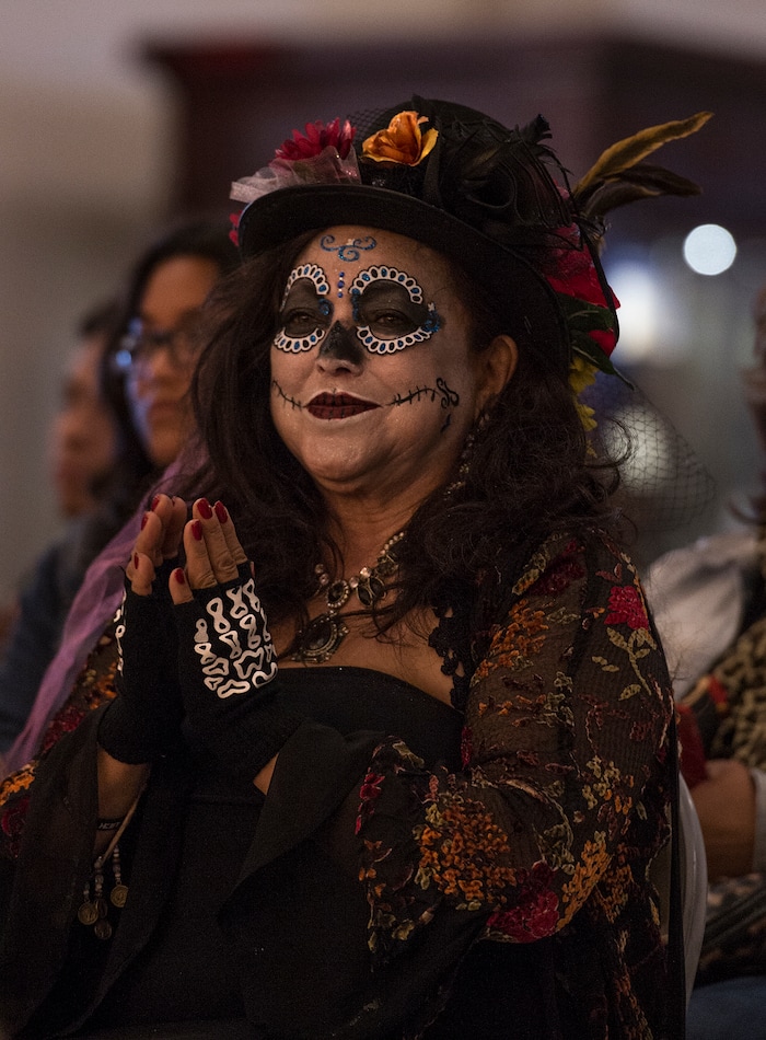 (Leah Hogsten | The Salt Lake Tribune) Josie Valdez claps for the dancers. Valdez participated as a judge of costumes during the contest as part of the Day of the Dead festival Saturday, October 21, 2017 at the Capitol.