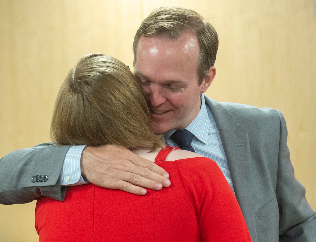 (Rick Egan  |  The Salt Lake Tribune)   Congressman Ben McAdams gives Julia Ludlow a hug, after she spoke about her suicide attempt at a news conference about suicide prevention, Monday, July 8, 2019.