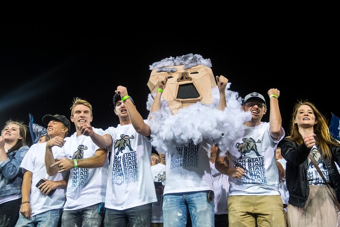 (Chris Detrick  |  The Salt Lake Tribune)  Utah State Aggies fans cheer during the game at Merlin Olsen Field at Maverik Stadium Friday, September 29, 2017. Utah State Aggies defeated Brigham Young Cougars 40-24.