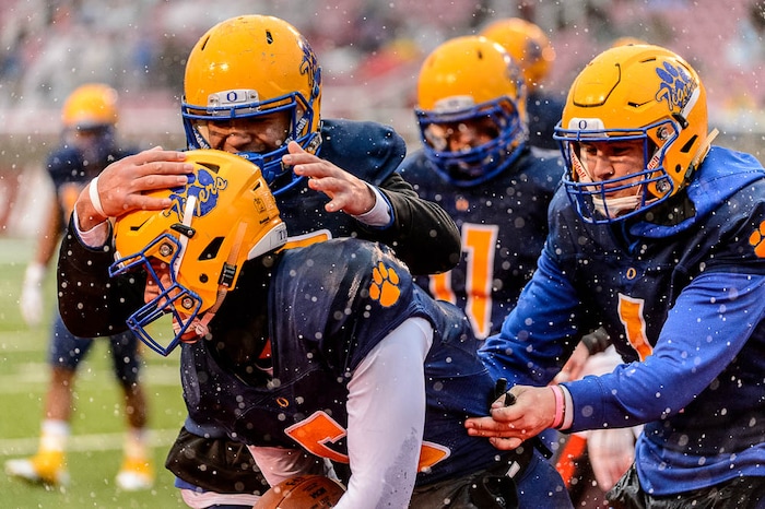 (Trent Nelson | The Salt Lake Tribune)  Orem's Cooper Legas (5) and teammates celebrate a touchdown as Orem faces Mountain Crest in the Class 4A High School State Football Championship game in Salt Lake City, Friday November 17, 2017.